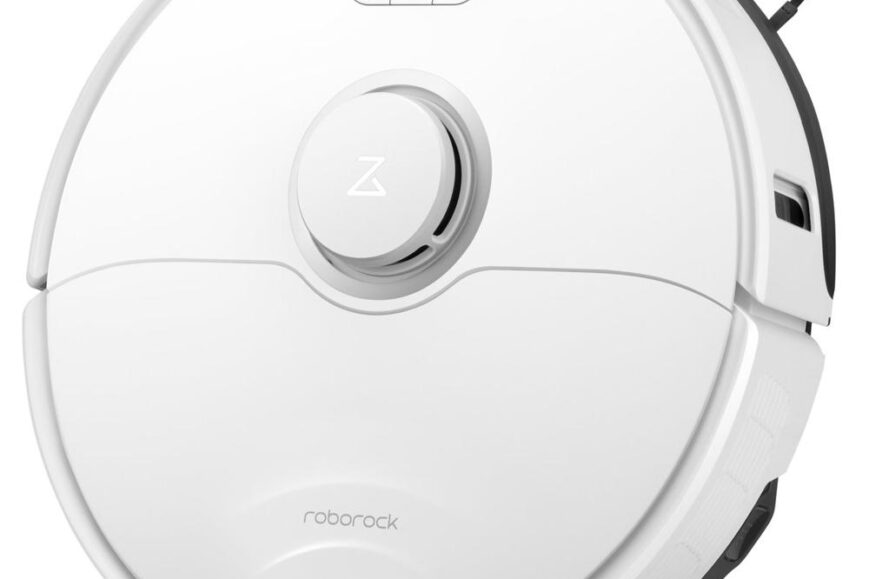 Een witte robotstofzuiger van het merk Roborock met een rond ontwerp en drukknoppen aan de bovenkant. De stofzuiger is uitgerust met een moderne uitstraling en efficiëntie voor het schoonmaken van verschillende vloeroppervlakken.