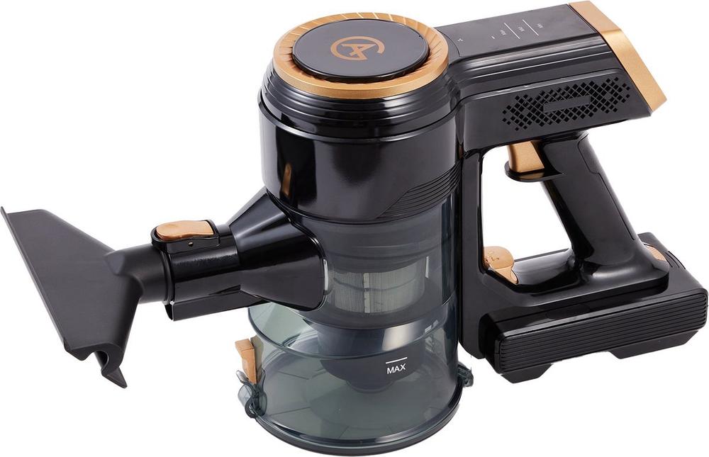 Draagbare zwarte stofzuiger met gouden accenten en transparante stofcontainer. De stofzuiger heeft een ergonomisch ontwerp en een krachtige zuigfunctie, ideaal voor het snel opruimen van kleine rommel.