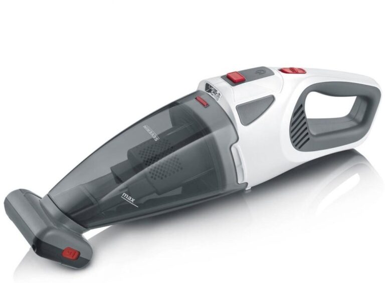 Een handstofzuiger met een modern, gestroomlijnd ontwerp in wit en grijs, voorzien van een doorschijnende afdekking zodat het interne filtersysteem zichtbaar is. De stofzuiger is uitgerust met knoppen voor aan/uit en verschillende functies, ideaal voor het snel schoonmaken van kleine ruimtes.